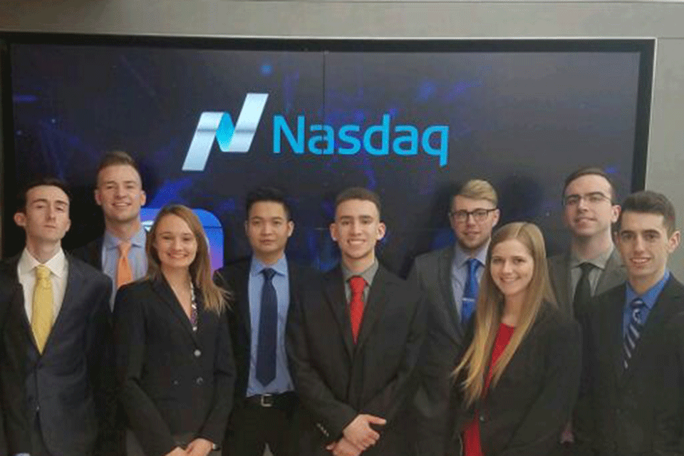 Students in Fisher's Investment Club visit the Nasdaq during a trip to New York City.