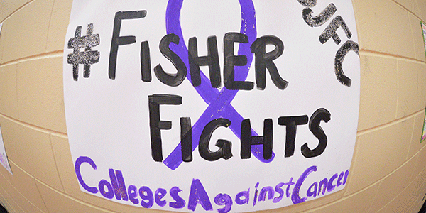 A poster promotes Colleges Against Cancer and their Fisher Fights message.