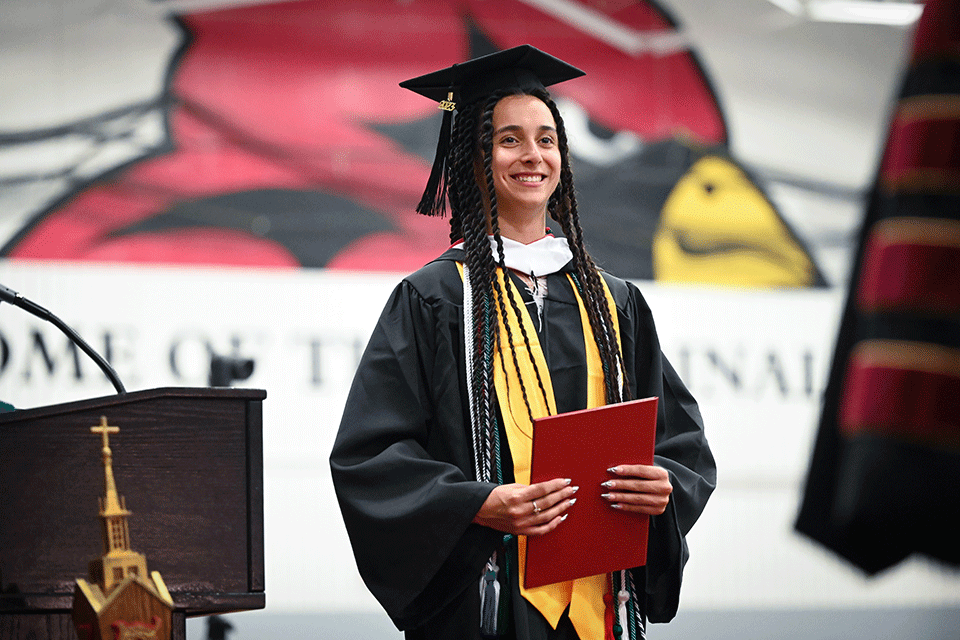 A graduate of the Class of 2022 at Commencement.