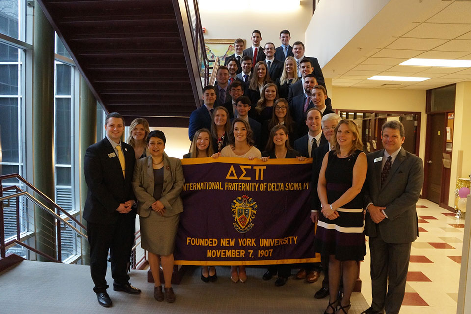 St. John Fisher College School of Business’s newly established Omega Psi chapter of the international business fraternity, Delta Sigma Pi.