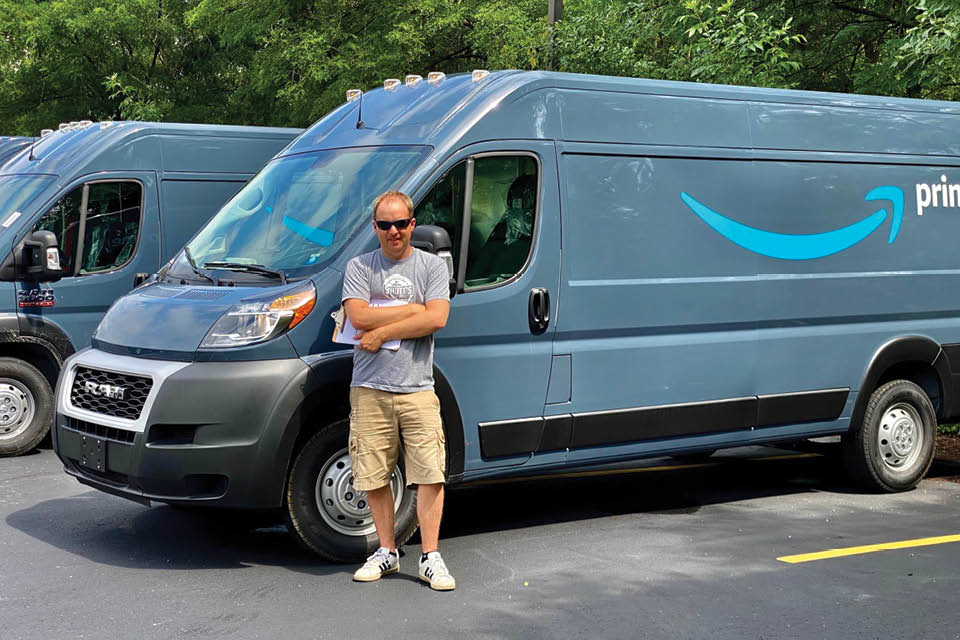 Bill Lang with an Amazon delivery van in the background