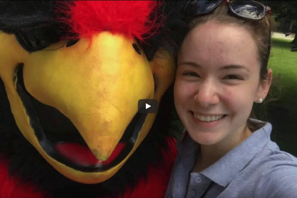 Abigal King poses with Cardinal.