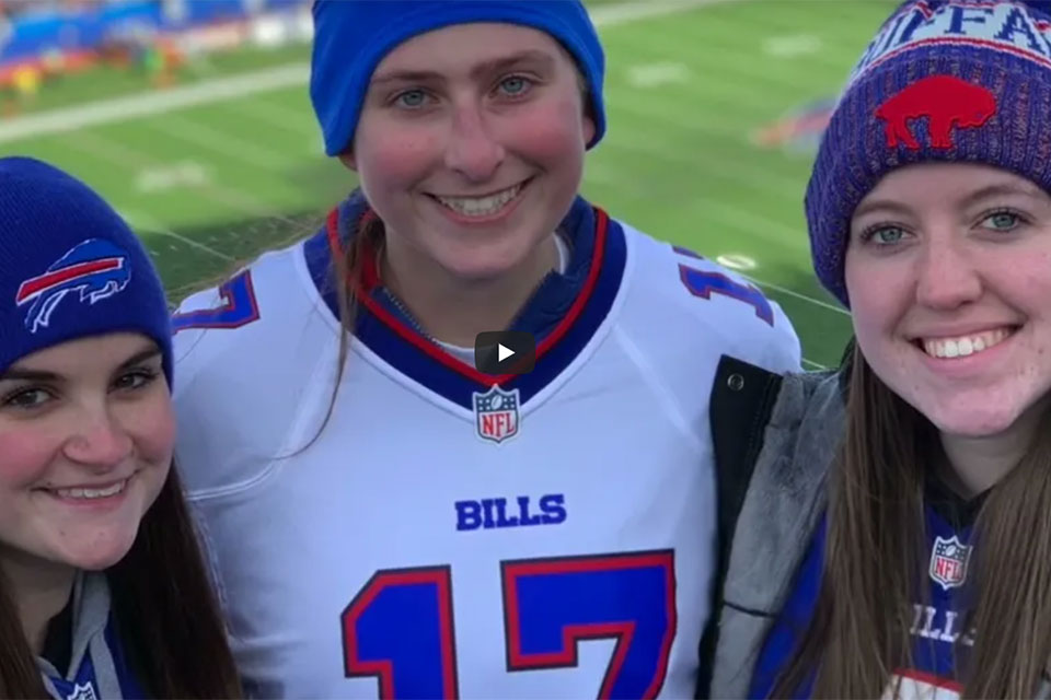 Rachel Makowski (center) with friends at a Buffalo Bills game.