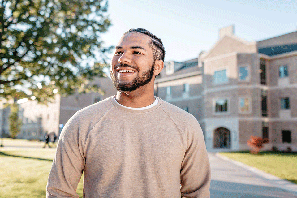 A smiling student on campus.