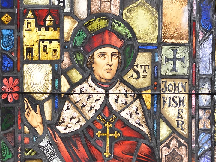 A detail of a stained glass image of Saint John Fisher.