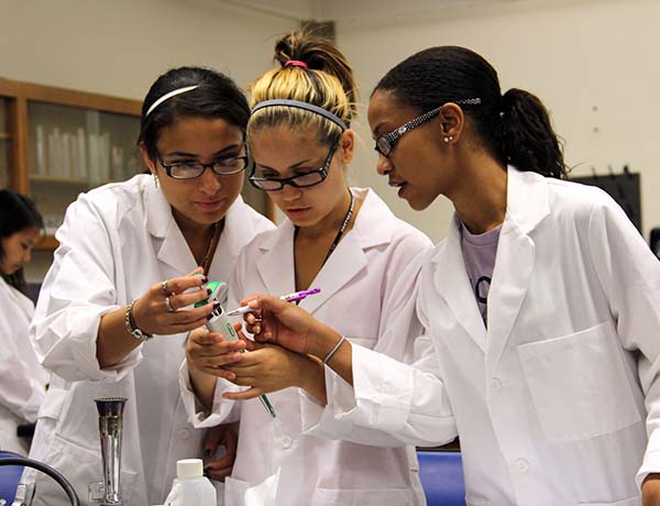 Three HEOP students in lab
