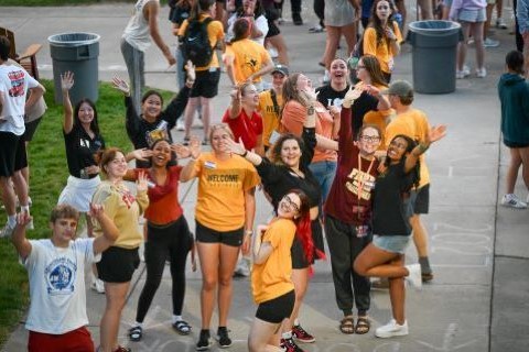A large group of students dancing during Welcome Weekend.